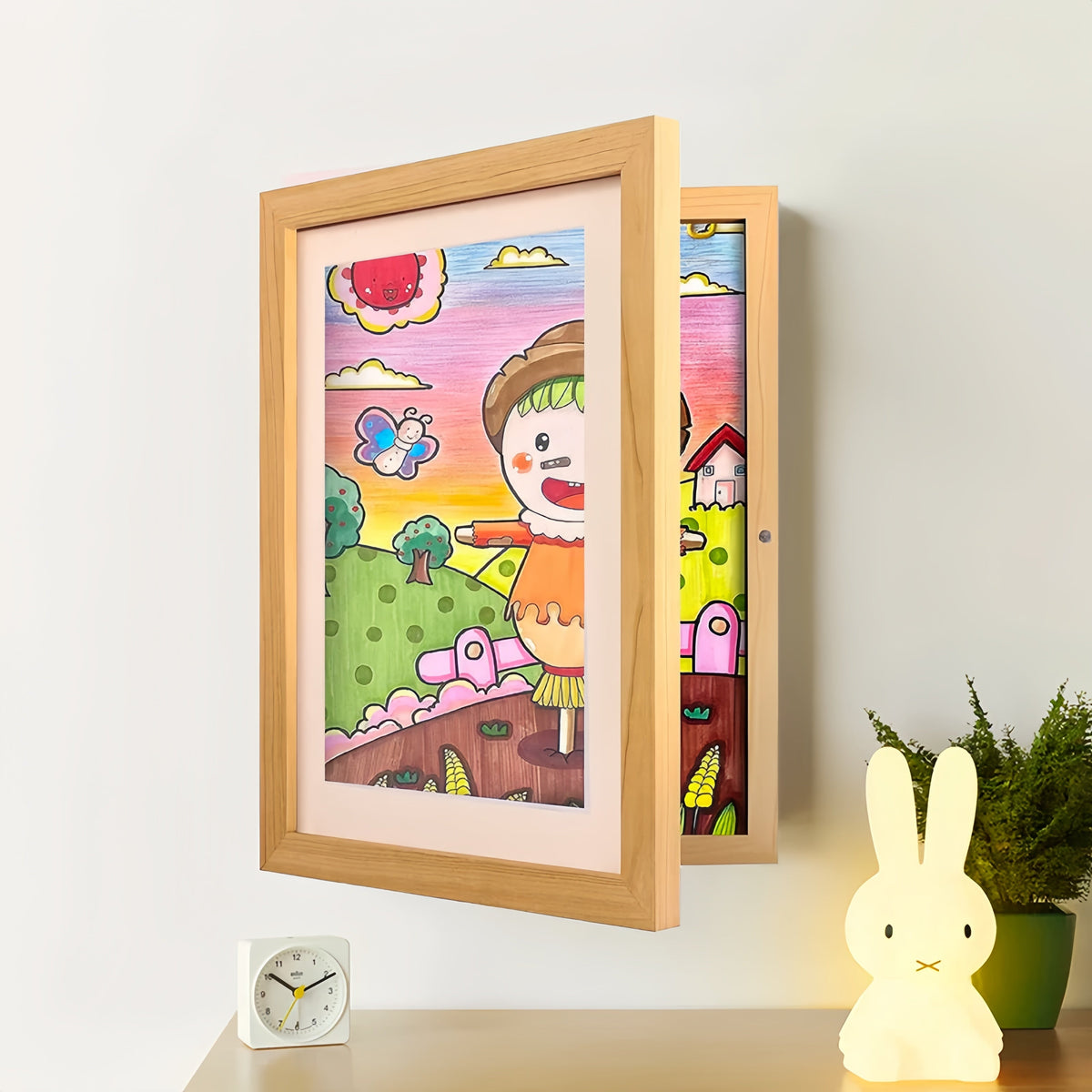 Kids Artwork Display Frame | Hidden Storage for 150 Pieces, Fits A4/US Letter | Magnetic Swap, White/Black/Wood 3