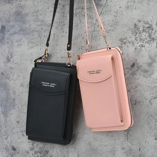 Black and pink crossbody bags with 'Forever Lovely' branding on a textured gray background