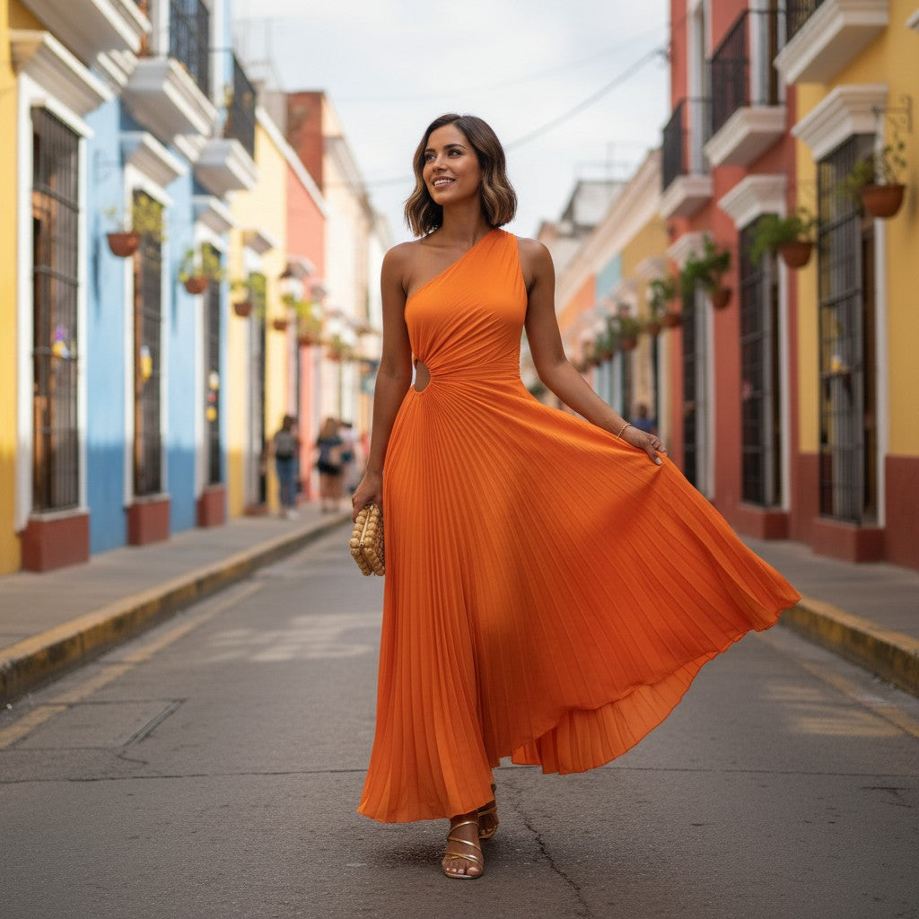 Woman in an orange dress standing on a colorful street